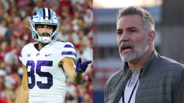 Kansas State wide receiver Kade Warner plays in a game in 2022. Former NFL quarterback Kurt Warner attends a Seahawks practice in 2022.